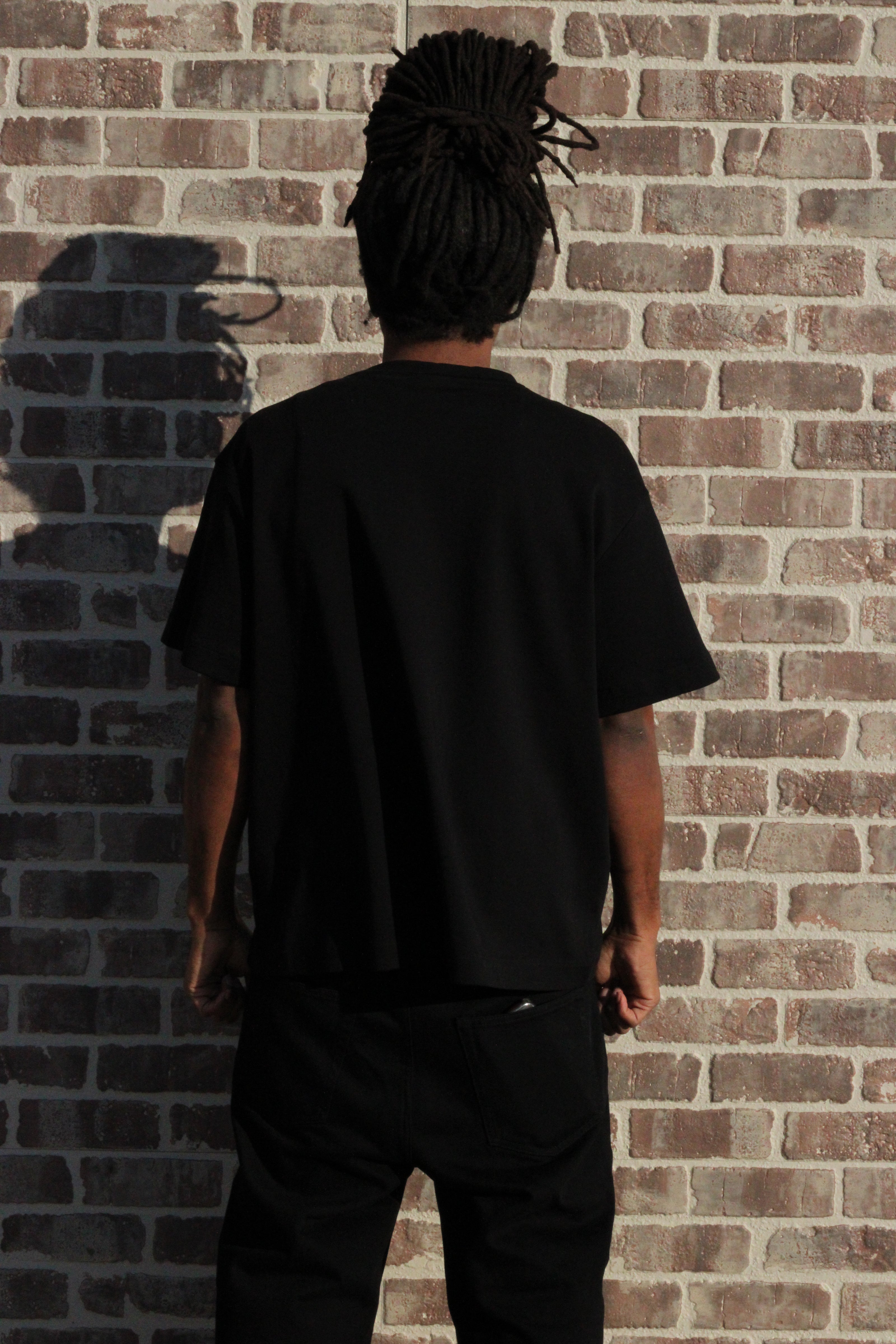 Black peace sign t-shirt back view